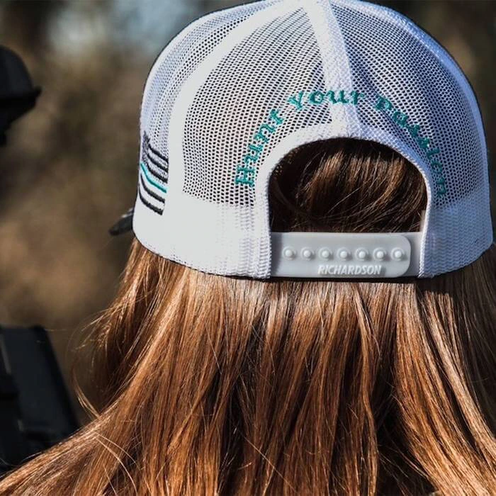 backside snapback closure of trucker hat