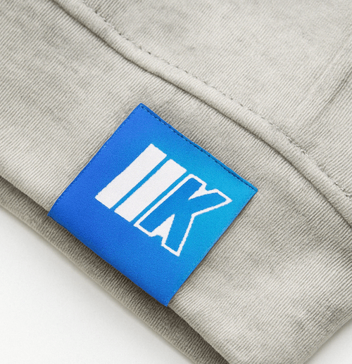 blue sublimated label on bottom of hoodie
