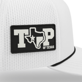 black and white TP PVC label on side of cap