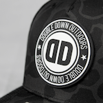 black and white DD patch on camo hat