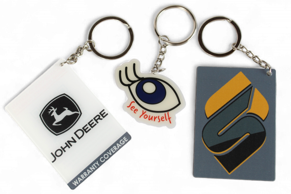 group of three acrylic keychains