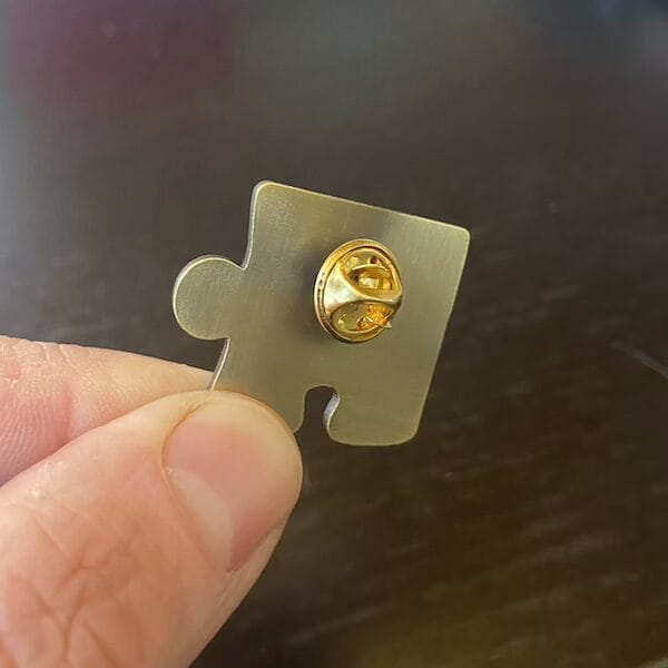 pin with butterfly clutch