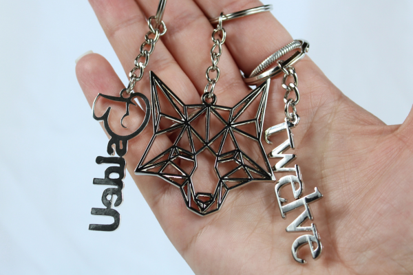 Three die-cast keychains